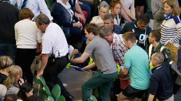 Nigel Sears is carried out of Rod Laver Arena.