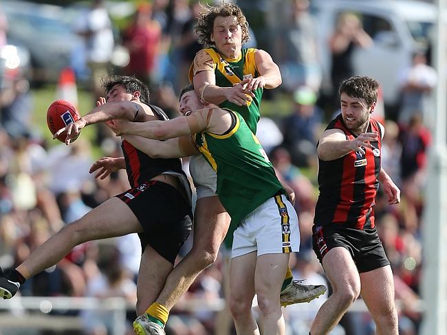 Gippsland Football League Grand Final match between Maffra Eagles and Leongatha Parrots. Maffra became the 2016 premiers, defeating Leongatha 13.10 (88) to 9. 16 (67). Patrick Jones and James Huts take on Cade Maskell and Aaron Hillberg. Picture: Yuri Kouzmin