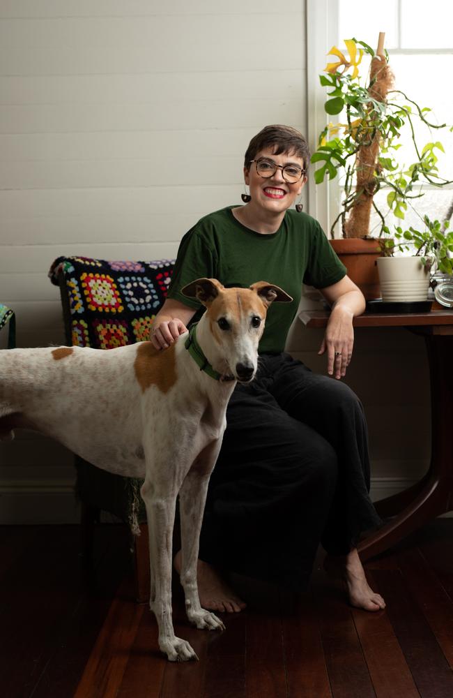 Greens MP Amy MacMahon at home with her dog Buddy. Picture: David Kelly