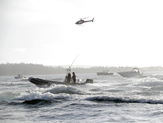 Flotilla on the Derwent. Wild Oats XI skippered by Mark Richards sails up the River Derwent on her way to a 9th line honours victory in the 2018 Sydney to Hobart Yacht Race. The yacht crossed the line in 1d 19hrs 7mins 21secs . Picture: RICHARD JUPE
