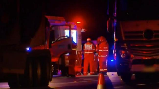 Emergency services at the scene last night in Woodburn. Picture: 9NEWS