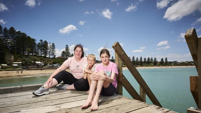 Locals Tara Gray with her kids Riley Gray, 8, and Ariana Gray, 12, in Port Elliot, where the Horseshow Bay pontoon has been removed. Picture: Matt Loxton