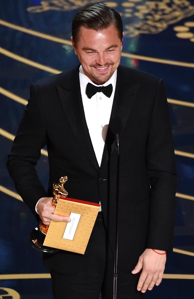 Leonardo DiCaprio accepts the Best Actor award for ‘The Revenant’. Picture: Kevin Winter/Getty Images)