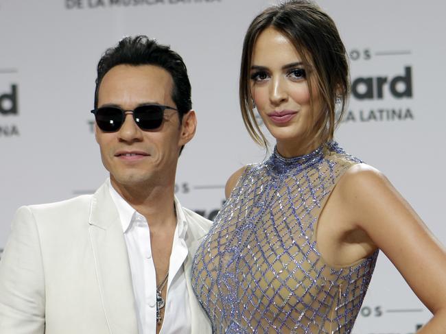 FILE- In this April 28, 2016, file photo, singer Marc Anthony and his wife Shannon de Lima arrive at the Latin Billboard Awards in Coral Gables, Fla. Anthony and his wife announced Sunday, Dec. 18, that they are divorcing after a two-year marriage. (AP Photo/Alan Diaz, File)