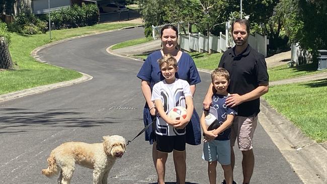 Tamara Bycroft and Christoph Heydrich with Oscar (10) and Connor (8) Heydrich on Spearwood Pl, with the treacherous S-bend in the background. The access point is proposed diagonally opposite their house.