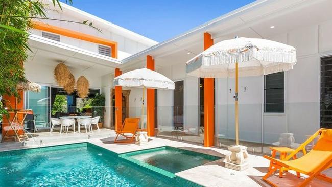 Fancy your own mini fruit orchard? Beside the beach and with a spa and steam room, this home has plenty to offer.