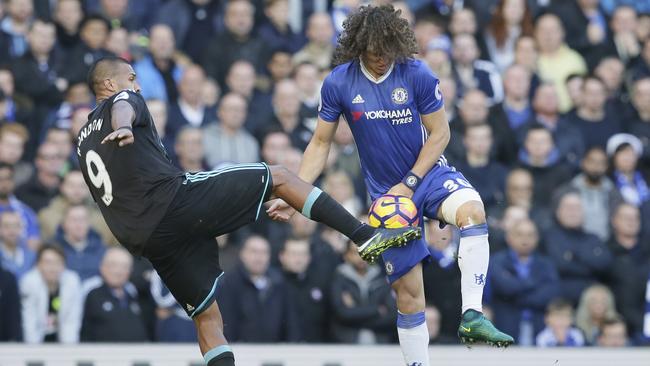 West Bromwich Albion's Jose Salomon Rondon (L) competes for the ball with Chelsea's David Luiz.