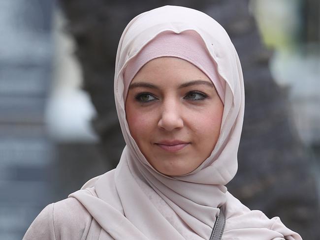 Rana Elasmar (scarf) arrives at Parramatta Court to give a victim impact statement .picture John Grainger