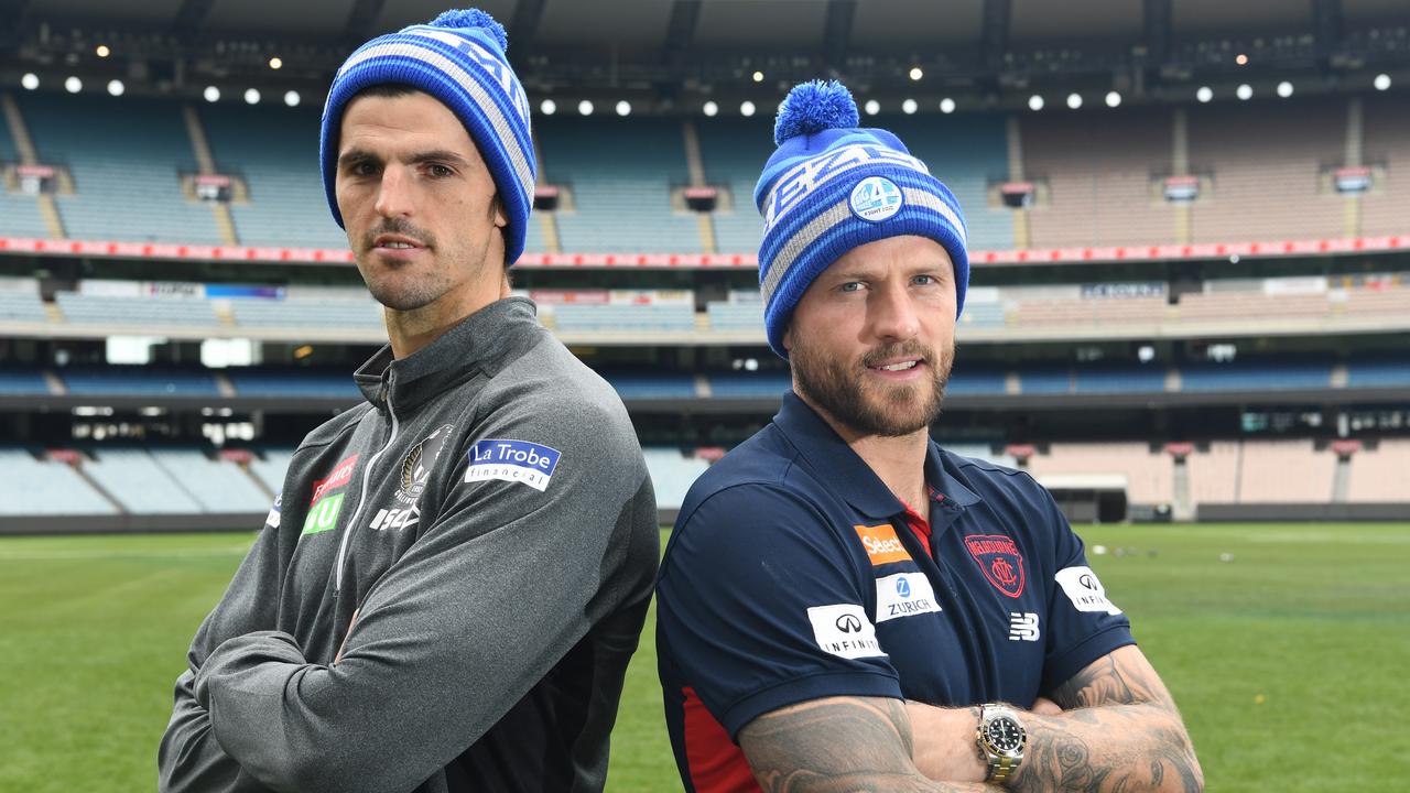 Collingwood captain Scott Pendlebury (left) and co-captain Nathan Jones pose for a photograph along the boundary line at the Melbourne Cricket Ground in Melbourne, Thursday, June 7, 2018. Pendlebury and Jones front the media ahead of the Queen's Birthday clash in support of FightMND. (AAP Image/James Ross) NO ARCHIVING