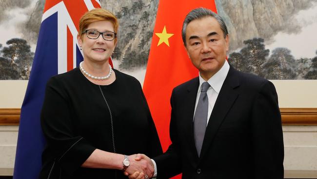 Marise Payne and Chinese counterpart Wang Yi in Beijing yesterday. Picture: AFP