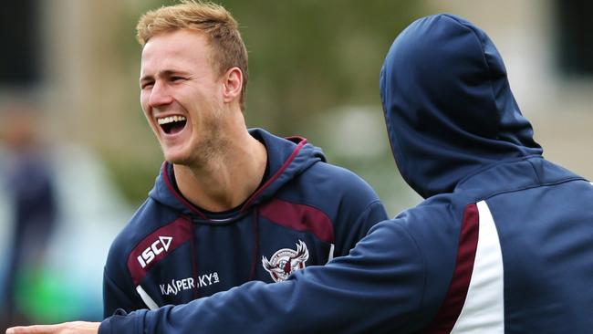 Daly Cherry-Evans shares a laugh with Andrew Johns during Manly Warringah Sea Eagles training at Narrabeen Sports Centre , Narrabeen .Picture Gregg Porteous