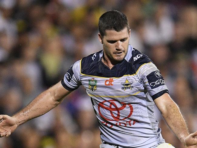 SYDNEY, AUSTRALIA - APRIL 09: Lachlan Coote of the Cowboys kicks a field goal during the round six NRL match between the Penrith Panthers and the North Queensland Cowboys at Pepper Stadium on April 9, 2016 in Sydney, Australia. (Photo by Brett Hemmings/Getty Images)