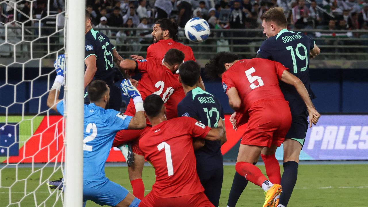 Australia's Harry Souttar scores his goal. Picture: Yasser Al-Zayyat / AFP