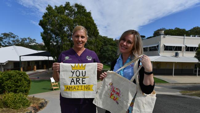 Clinical nurse Hospital and Home Rebecca Gardiner with Trinity deputy principal Kelly Dernehl.