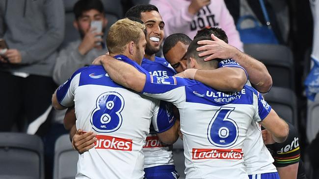 Reimis Smith celebrates scoring a try with his Bulldogs teammates. Picture: AAP