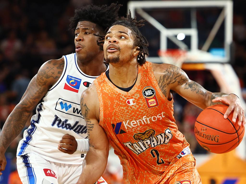 Adelaide's Kendric Davis and Taipans' Rob Edwards go head to head.. Picture: Brendan Radke