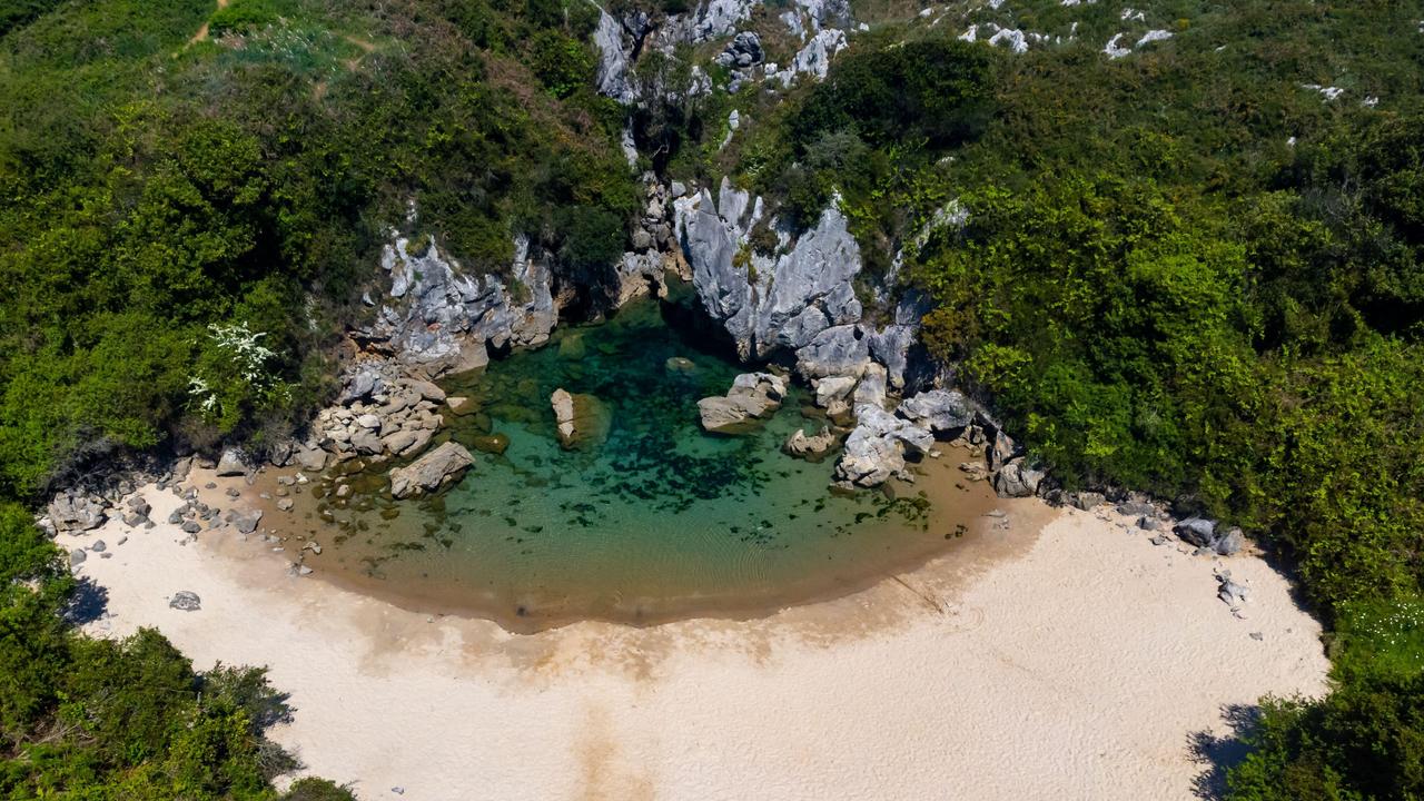 The smallest beach in the world is situated in a very unlikely location. Picture: Alamy