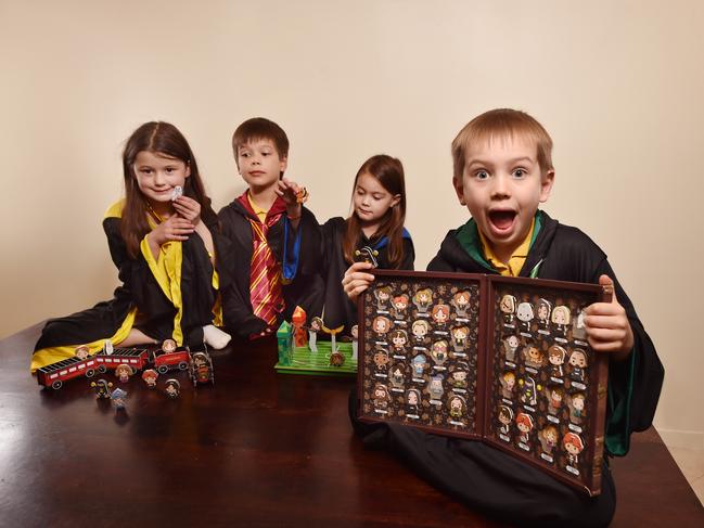 MELBOURNE, AUSTRALIA - JUNE 22ND, 2022 : Coco, 7, Arley, 8, Yumi 5 and Rafe, 6 playing with Coles latest set of collectibles, Magic Builders, featuring characters from Harry Potter and Fantastic Beasts. Picture : Nicki Connolly