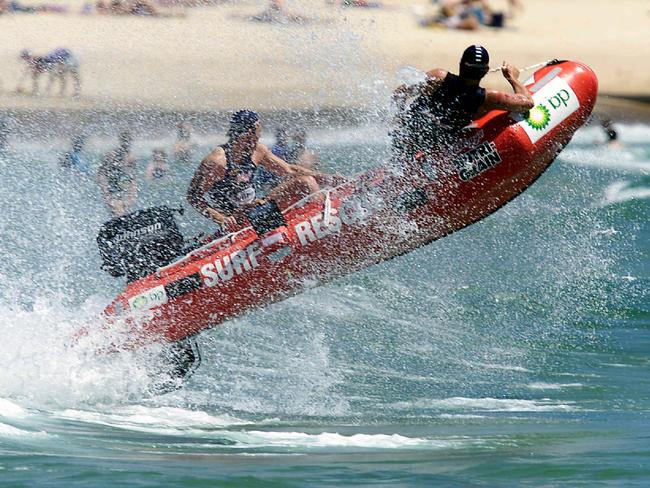 Surf lifesaving – Surf lifesaver Jason Wyatt with Scott Ivey in motor boat race at National Surf League at Manly Beach 03 Dec 2000. racing a/ct