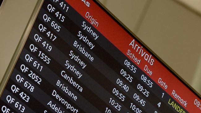 Passengers from Sydney flock to Melbourne for Christmas. Picture: Andrew Henshaw