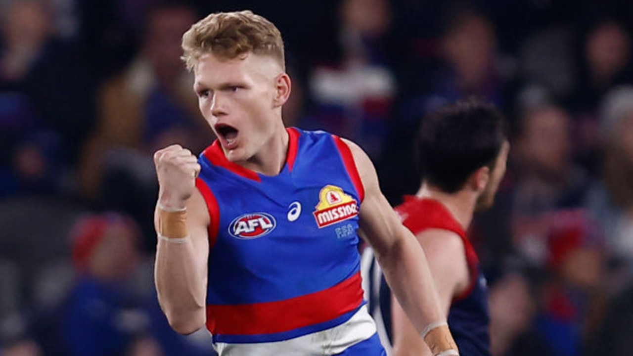 MELBOURNE, AUSTRALIA - JULY 23: Adam Treloar of the Bulldogs is celebrates a goal during the round 19 AFL match between the Western Bulldogs and the Melbourne Demons at Marvel Stadium on July 23, 2022 in Melbourne, Australia. (Photo by Darrian Traynor/Getty Images)