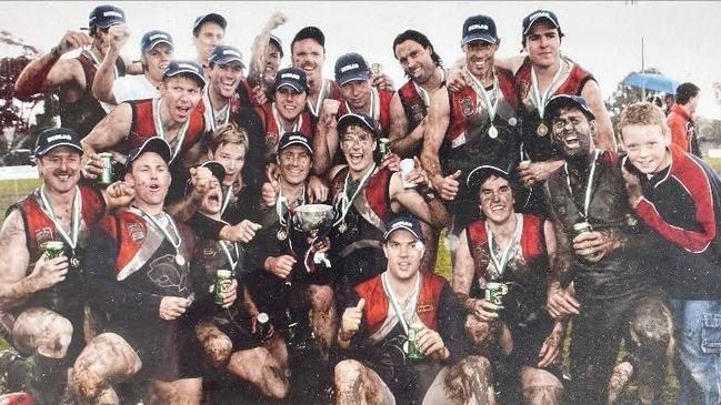 Highett celebrate its 2004 premiership against Springvale Districts.