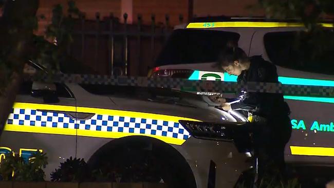 Police and ambulance at Londonderry Ave, Salisbury Downs on Wednesday night following a fatal stabbing. Picture: 9News