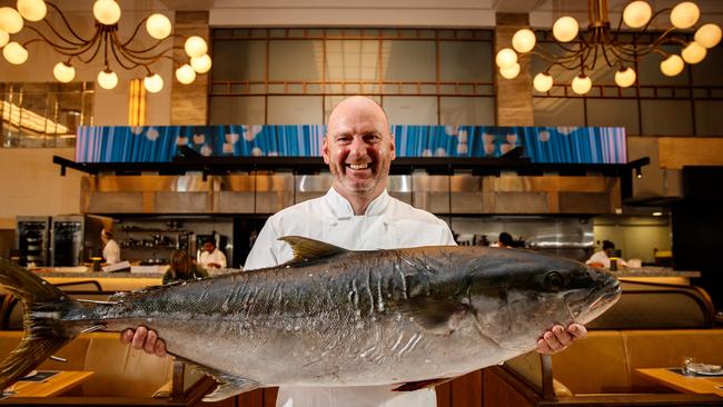 Fishbank executive Tony Carroll with a wild kingfish at Fishbank in Adelaide. Picture: Matt Turner