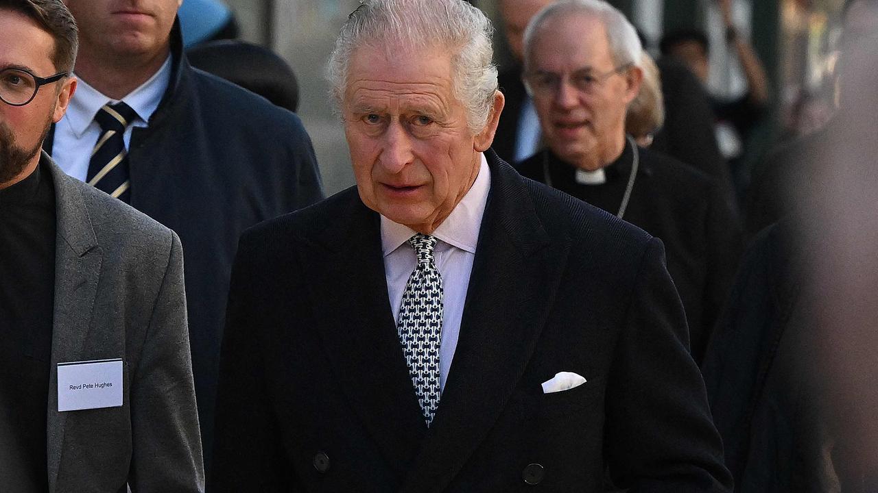 Britain's King Charles III walks to attend an Advent Service at The Ethiopian Christian Fellowship Church, in London on December 8, 2022. (Photo by JUSTIN TALLIS / POOL / AFP)