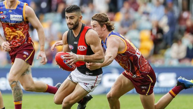 Adam Saad breaks a tackle against the Brisbane Lions. Picture: AAP