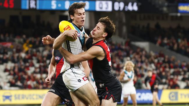 Connor Rozee and Nic Martin go head to head. Picture: Daniel Pockett/Getty Images