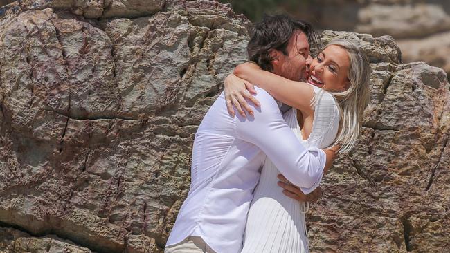 Two time Bachelor contestant Michael Turnbulls surprise proposal to his Gold Coast beauty Queen partner Charlotte Cush as they announce they are having a baby.Picture: Glenn Campbell