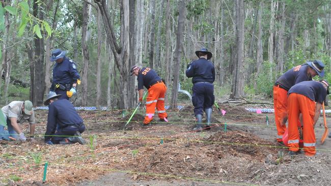 Gympie Police and SES crews conducting a search at the Goomboorian property where Bruce Saunders died in a woodchipper last year.