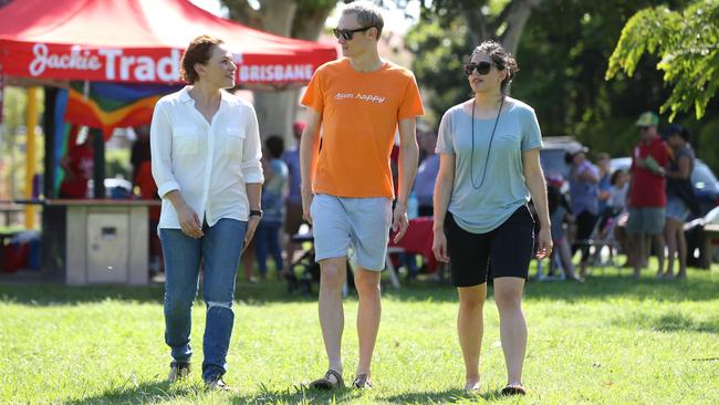 Jackie Trad meets locals Ryan Waddington and Paula Plastic in Rotary Park in Woolloongabba. Picture: Peter Wallis