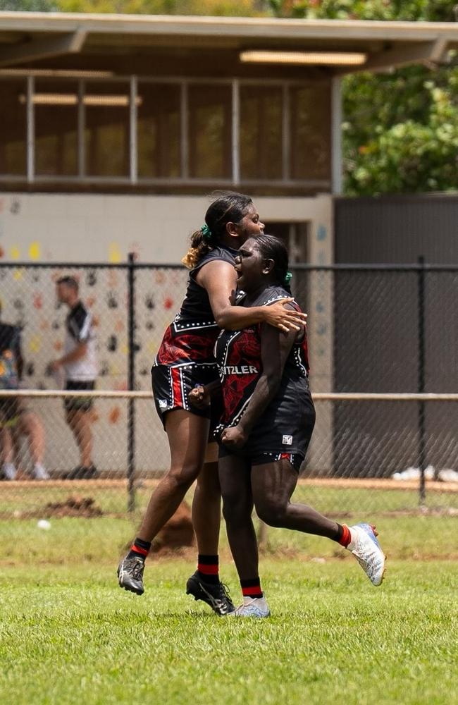 The Tiwi Bombers women celebrating in Round 9 of the 2024-25 NTFL season. Picture: Jack Riddiford / AFLNT Media