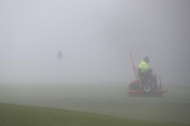 A worker prepares the greens at the North Adelaide Golf Club on July 14. Picture: Tait Schmaal