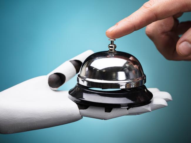 ESCAPE: Hotel Robots, Barry Matheson -  Person's Ringing Service Bell Hold By Robot On Turquoise Background . Picture: iStock