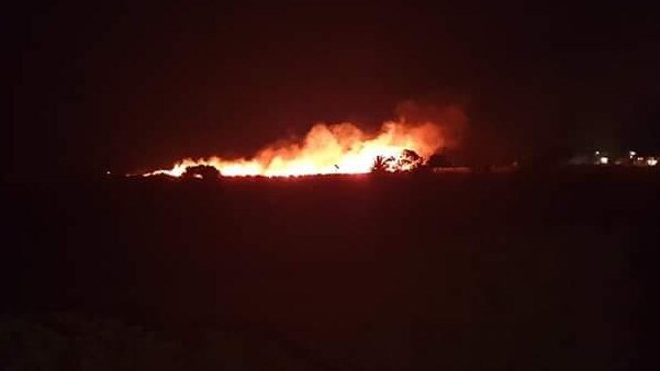 A grass fire that took hold at Aldinga Beach on Friday night, which the CFS says was caused by illegal fireworks. Picture: CFS.