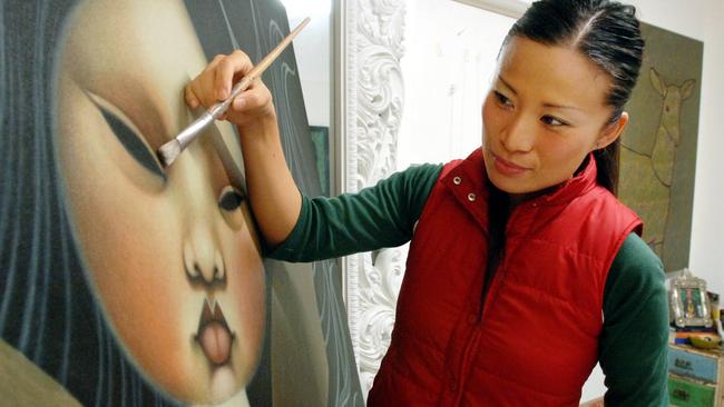 SA artist Poh Ling Yeow painting in her Norwood studio.