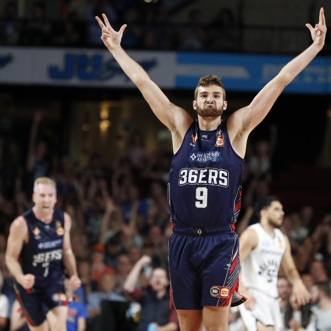 Jack McVeigh celebrates a three-point shot during his time with the Adelaide 36ers. Picture: AAP Image/Kelly Barnes