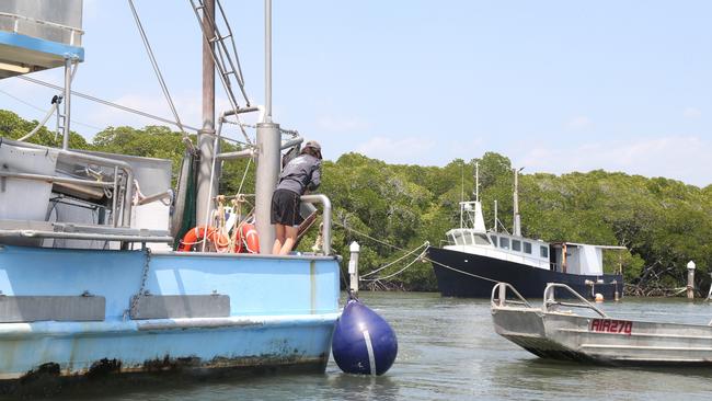 Boaties make preparations in Port Douglas as Cyclone Jasper moved toward the Far North coastal town. Picture: Peter Carruthers