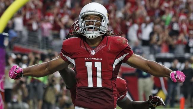 Arizona Cardinals wide receiver Larry Fitzgerald celebrates his touchdown.