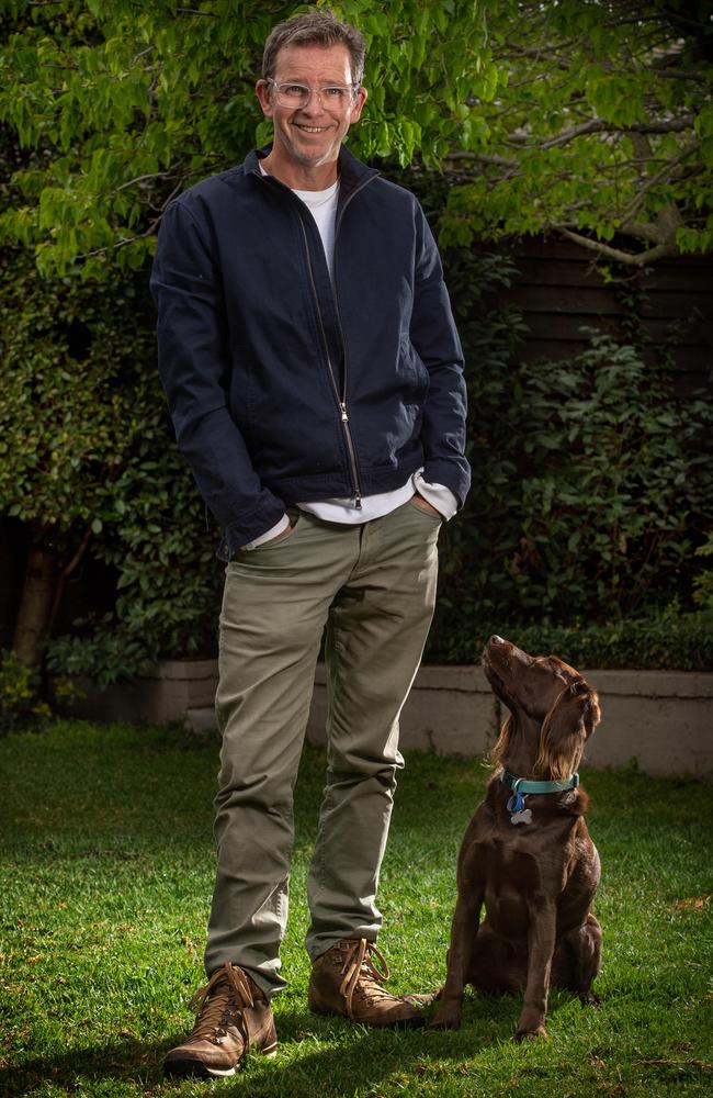 Ben Crowe at home with his dog Molly. Picture: Tony Gough