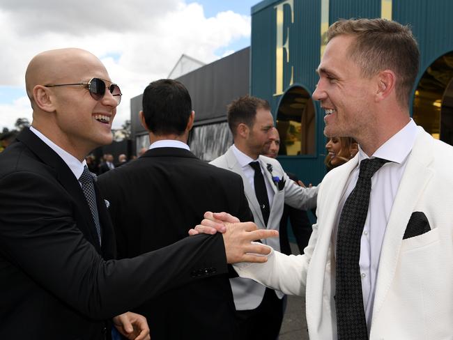 Reunited: Gary Ablett and Joel Selwood in the Birdcage. Picture: Joe Castro, AAP Image.