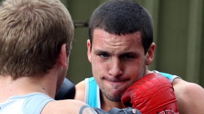 A young Travis Boak during a Port Adelaide boxing session.