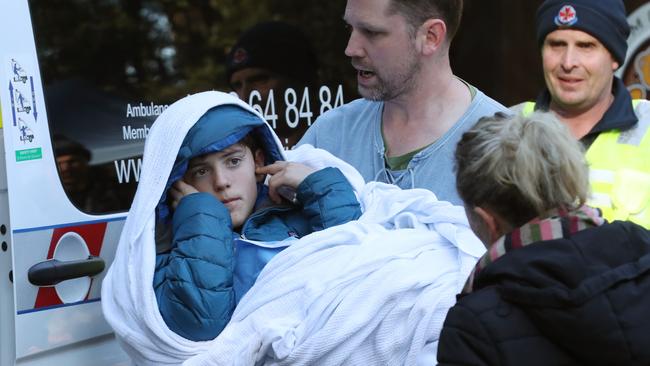 William back in the arms of family. Picture: David Crosling