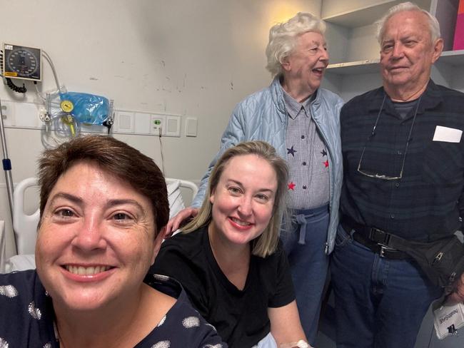 Margaret Lawson in hospital with her sister Michelle and parents Jan and Des Lawson.