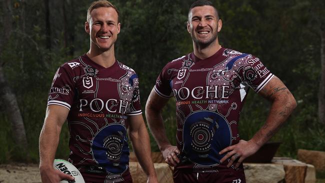 Manly players Daly Cherry-Evans and Joel Thompson pose with the club’s indigenous jersey Picture: Brett Costello