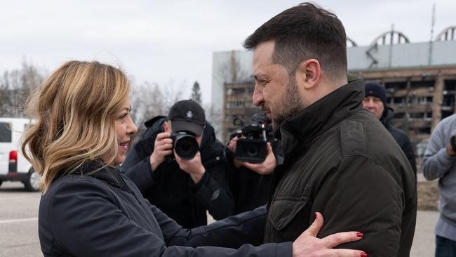 Ukraine's President Volodymyr Zelensky greets Italy's Prime Minister Giorgia Melonin Kyiv during a visit on the second anniversary of the Russian invasion of Ukraine. Picture: Palazzo Chigi press office / AFP