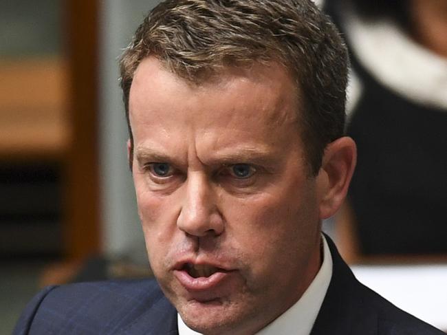 Australian Social Services Minister Dan Tehan speaks during House of Representatives Question Time at Parliament House in Canberra, Thursday, February 8, 2018.  (AAP Image/Lukas Coch) NO ARCHIVING